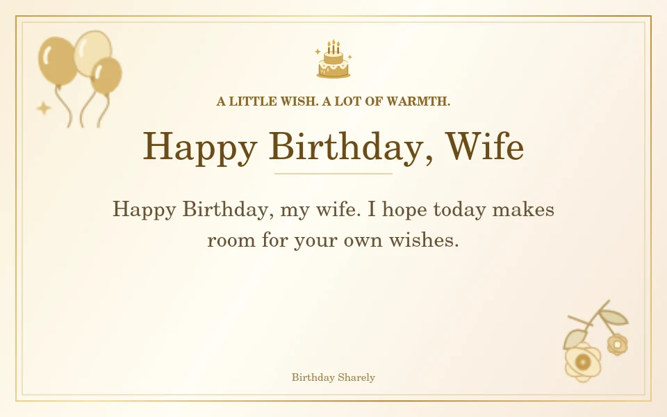 Gold birthday card reading “Happy Birthday, Wife”.